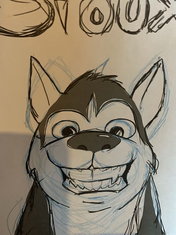 Ink and pencil cartoon sketch of Sioux the husky: a grinning dog face with big eyes and pointed ears, with his name hand-lettered along the top edge.